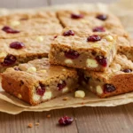 Gordon Ramsay Blondies dessert bars on a rustic tray