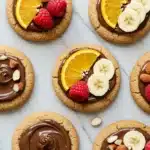 Gordon Ramsay Fondue Cookies topped with chocolate, fruit, and nuts