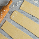 Gordon Ramsay puff pastry dough being rolled out