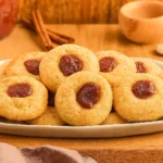Apple Butter Thumbprint Cookies on rustic tray