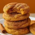 Chewy Pumpkin Snickerdoodle Cookies stacked on plate