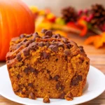 Chocolate Chip Pumpkin Bread loaf on rustic table