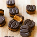 Chocolate Pumpkin Butter Cups on a fall-themed table