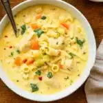 Creamy Chicken Pasta Soup served with bread