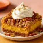 Keto Pumpkin Crisp dessert with pecan topping