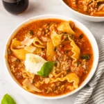 TikTok Lasagna Soup served with garlic bread