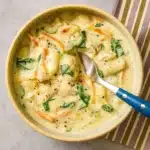 Copycat Olive Garden Chicken & Gnocchi Soup in a ceramic bowl
