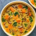 Cozy Autumn Wild Rice Soup served in rustic kitchen