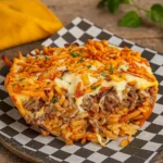 French Onion Ground Beef and Rice Casserole baked in a white dish