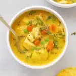 Healthy Chicken Pot Pie Soup in a rustic bowl