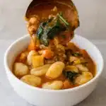 Italian Chicken and Autumn Veggie Soup in rustic bowl