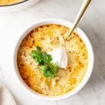 Keto White Chicken Chili served in a white bowl with toppings