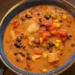 Southwest Turkey Soup in a bowl with toppings