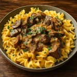 Beef Stroganoff with Egg Noodles in Rustic Bowl