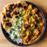 Easy homemade Indian chicken curry with rice and naan