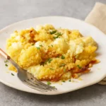 Gnocchi Mac and Cheese in baking dish with golden topping