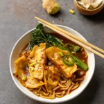 Gyoza Chilli Noodle Soup in a bowl with crispy dumplings
