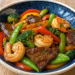 High-Protein Steak and Shrimp Stir-Fry plated meal