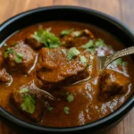 Lamb Curry Recipe served in rustic bowl
