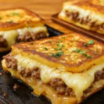 Patty Melts with Secret Sauce on rustic plate