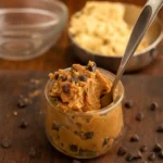 4 Ingredient PB2 Protein Cookie Dough in a jar with chocolate chips