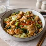 Chinese Chicken Cabbage Stir-Fry in a Wok