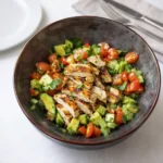 Healthy Avocado Chicken Salad with chicken, avocado, and fresh vegetables