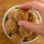 Salted Caramel Protein Balls on a wooden board