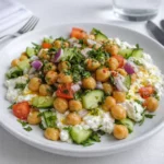 Cottage Cheese and Chickpeas Salad served in a rustic bowl