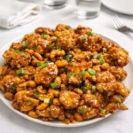 easy authentic cashew chicken served over rice