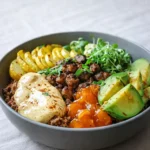 High Protein Burger Bowl with ground beef, veggies, and brown rice