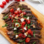 Balsamic Grilled Flank Steak Caprese plated with tomatoes and mozzarella