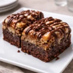 Fudgy Banana Bread Brownies stacked on a wooden board