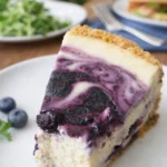 Best Blueberry Cheesecake slice on a plate