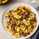 Cheesesteak Tortellini Provolone Sauce in a bowl