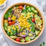 Top view of Cilantro Lime Grilled Chicken Salad with avocado and corn