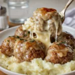Crock Pot French Onion Meatballs served with melted cheese and bread