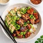 Honey Sriracha Salmon Bowls with avocado and rice