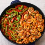 30 Minute Sweet Chili Shrimp served over white rice with bell peppers
