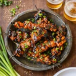 Grilled Honey Garlic Asian Chicken Kabobs with sesame seeds and green onions.