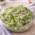 Fresh Parmesan Chopped Salad with lemon and shallots in a wooden bowl